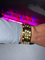 stack of gold diamond bracelet 