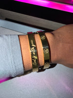 Gold engraved God is with you affirmation bracelet stacked with a royalty cuff bracelet stack