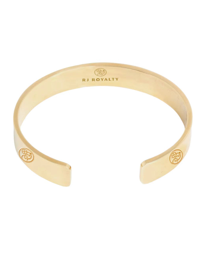 Gold bracelet with 'RJ Royalty' branding on a white background