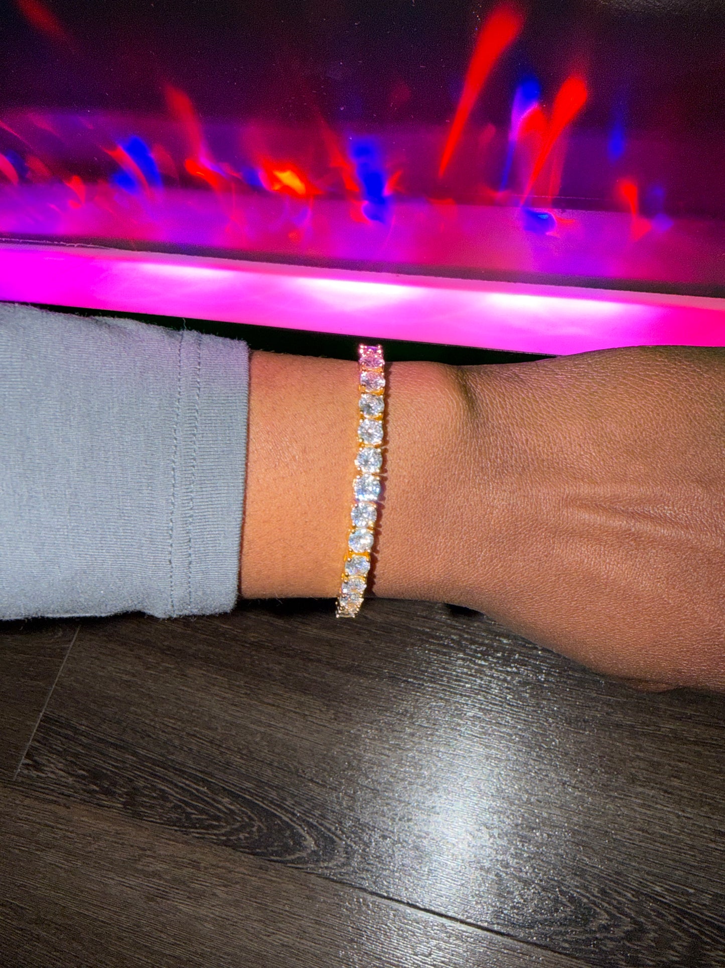 Classic gold tennis Bracelet on a wrist 