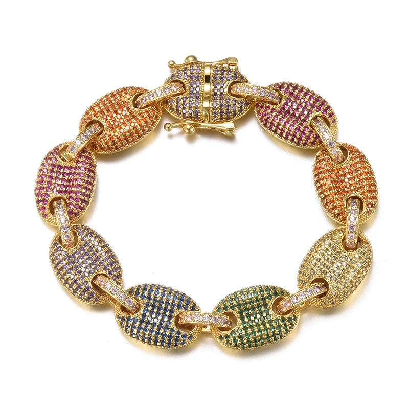 A multicolored, mariner link-style coffee bean bracelet with gold plating and simulated diamonds.