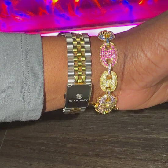  mariner link-style coffee bean bracelet with gold plating and simulated diamonds with a two toned watch.