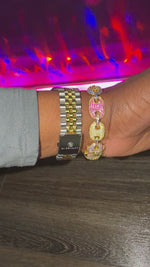  mariner link-style coffee bean bracelet with gold plating and simulated diamonds with a two toned watch.