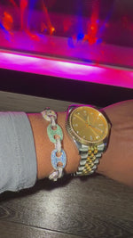 silver mariner link bracelet with diamonds and champagne watch on wrist 