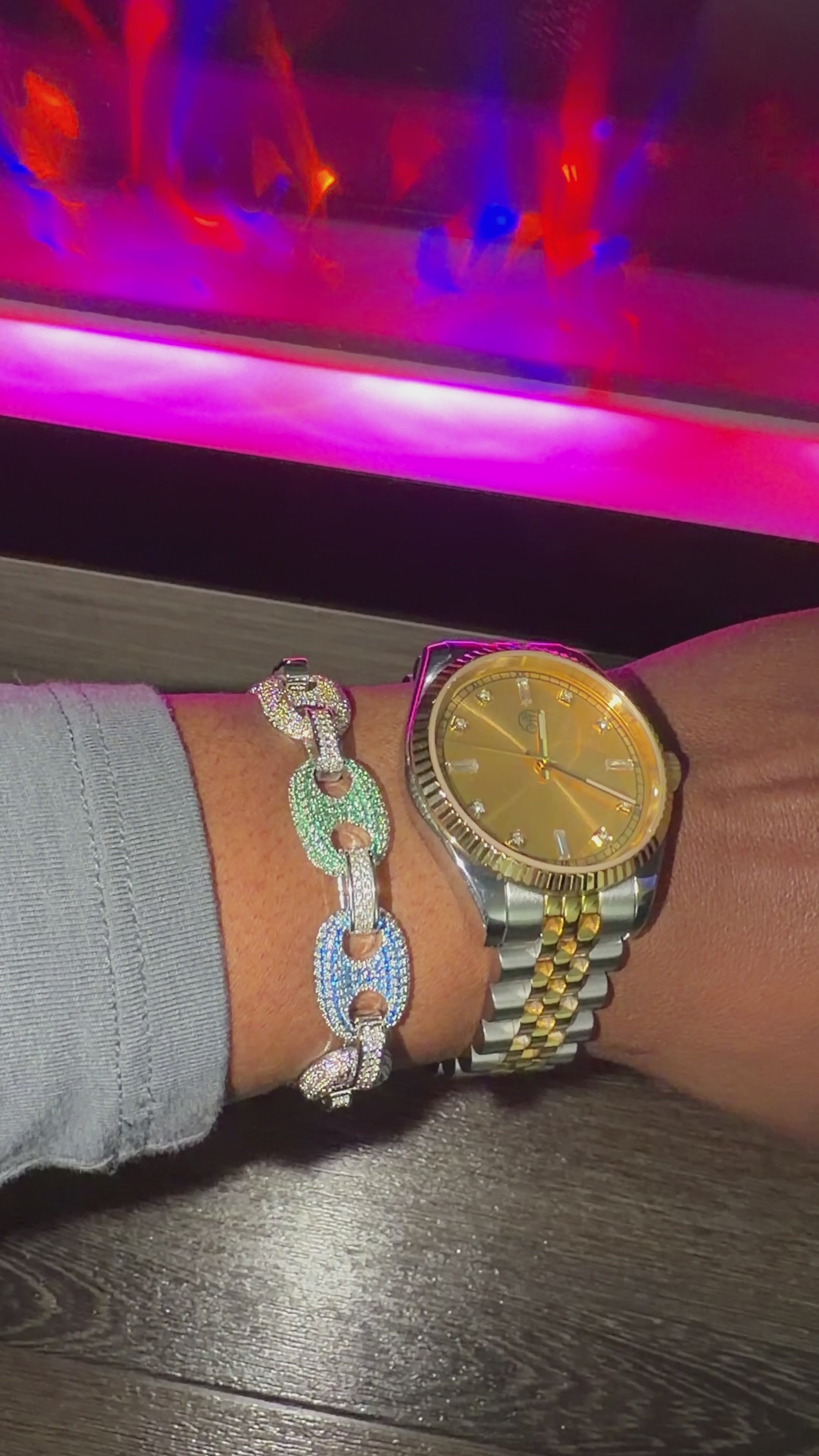 silver mariner link bracelet with diamonds and champagne watch on wrist 